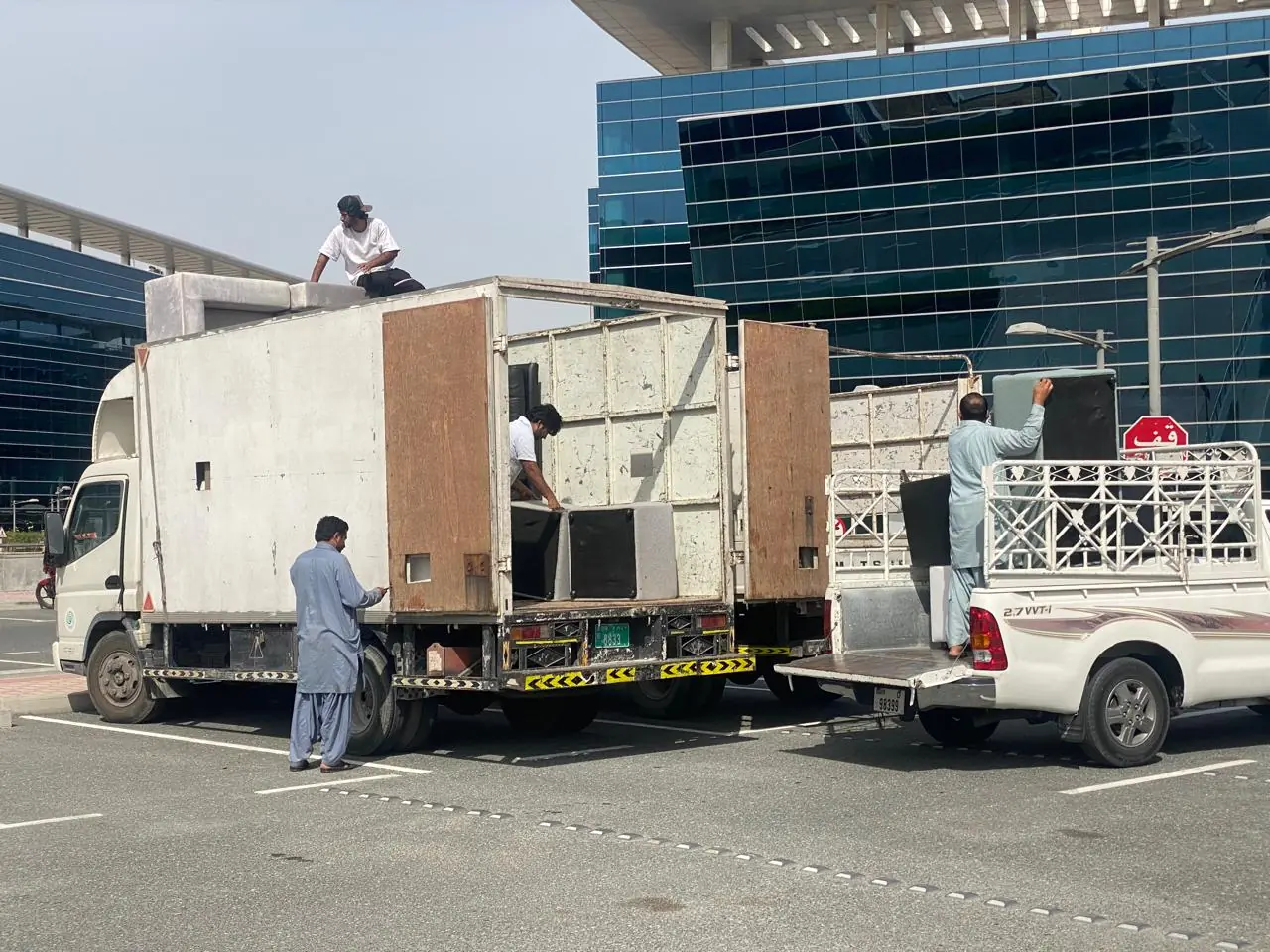 Our crew loading donated furniture onto trucks in Dubai