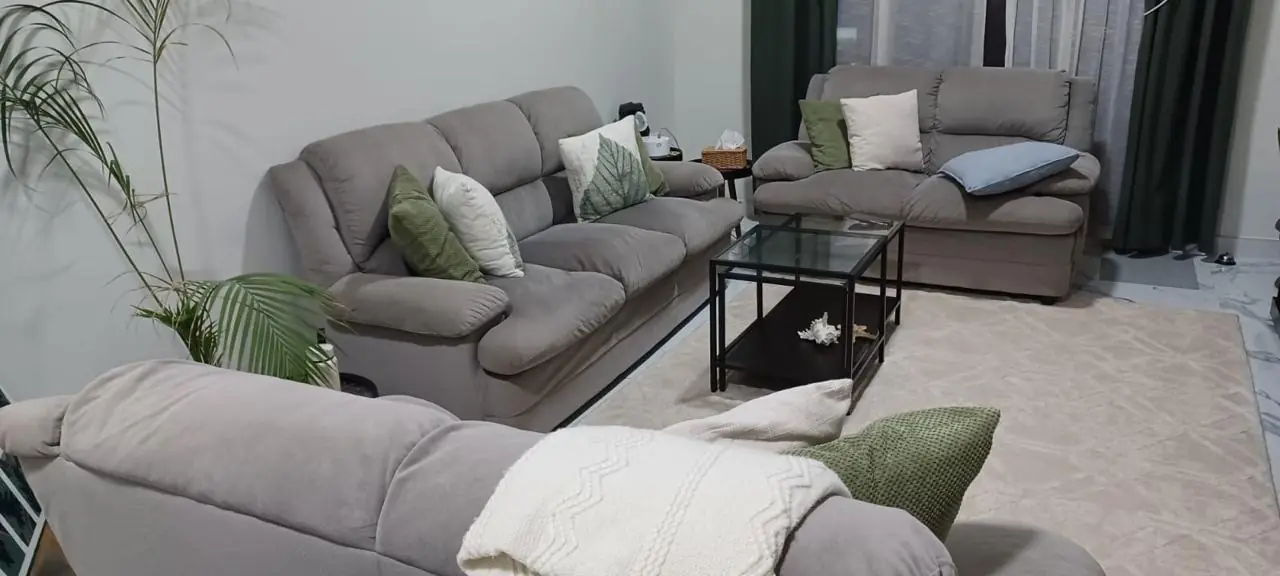 Grey sofas and coffee table donated from a Dubai home