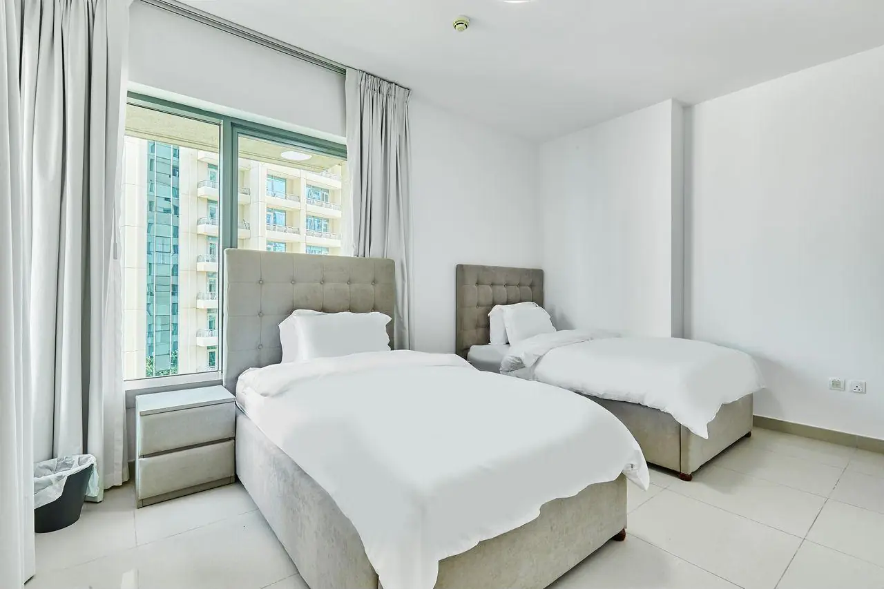 Two single beds with headboards donated in Dubai