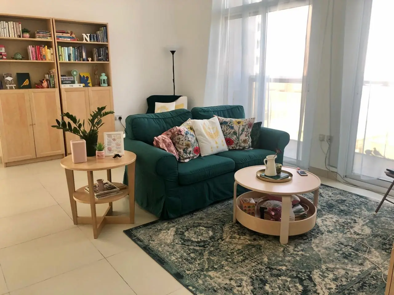Living room sofa, tables and bookshelf donated for a family in need
